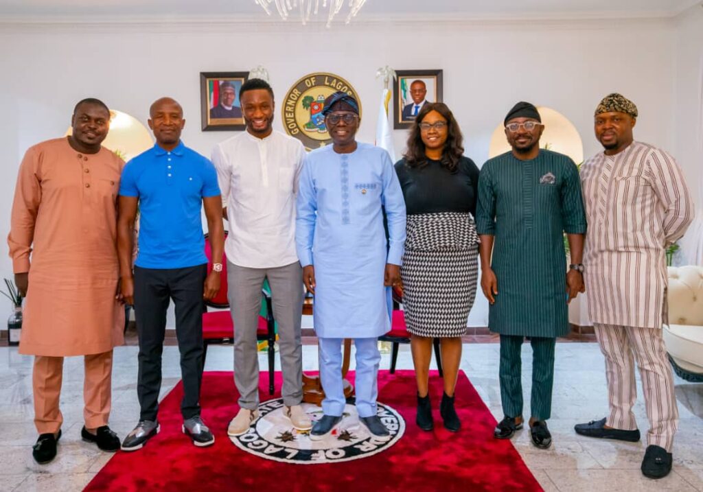 L-R Mr Gbolahan Agberemi (Director of global project and government relations QSSL), Mr Kwame Hadji (Director of grassroots and logistics QSSL), With John Mikel Obi and Gov. Babajide Sanwo-Olu (Lagos state Governor) at the State House, Lagos Nigeria.